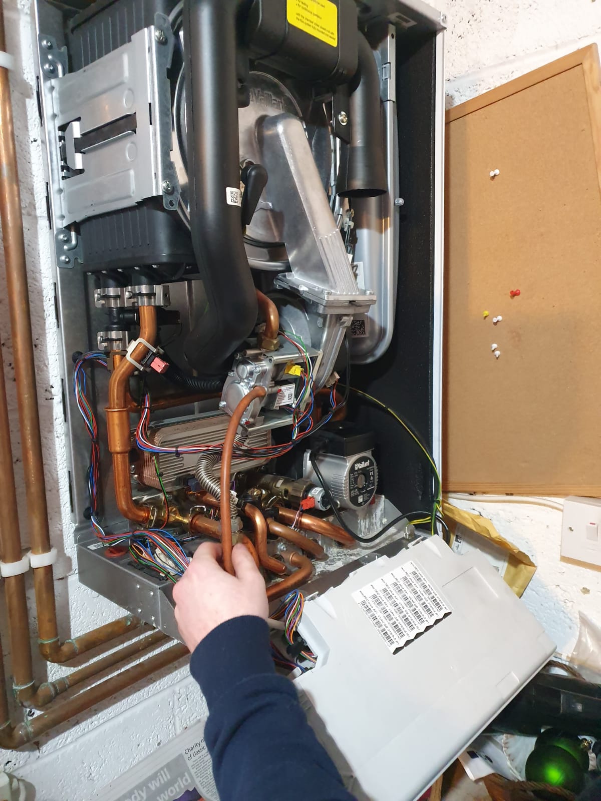 MDF Gas engineer working on a domestic boiler in Telford